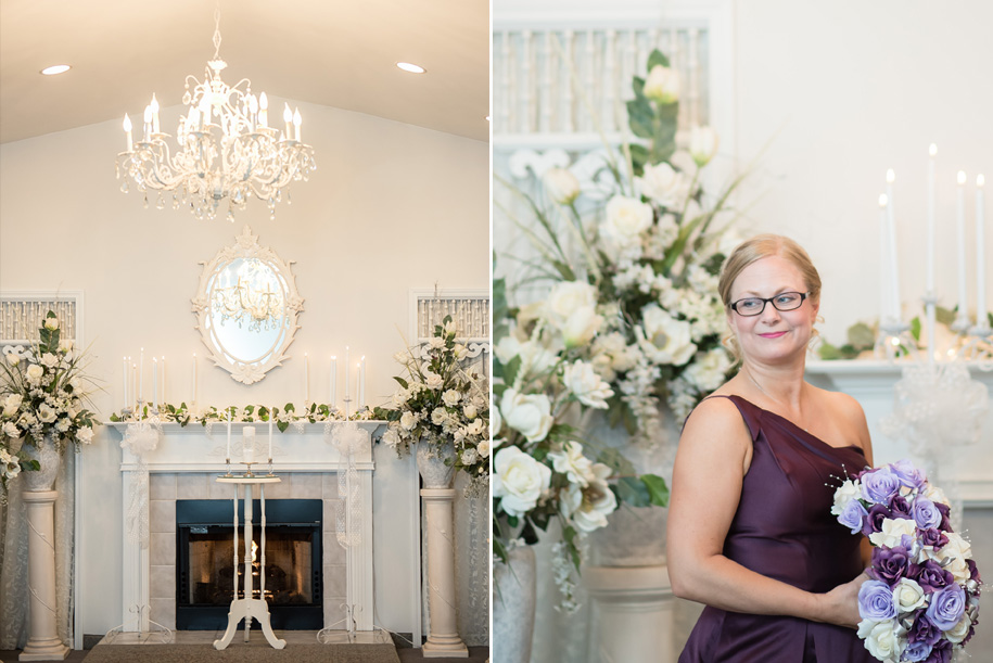 Wedding Ceremony Arrangements: The altar is flanked by white urns that hold classic arrangements of white florals. Mantle is adorned with a drape of florals in white. Finishing touches include an elegant mirror, crystal chandelier and baby's breath wreaths.