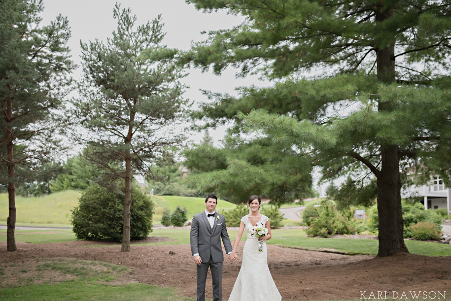 Lace wedding dress with open back l Rustic bouquet l Grey tuxedo l Bow tie l Rustic elegant black tie country club wedding