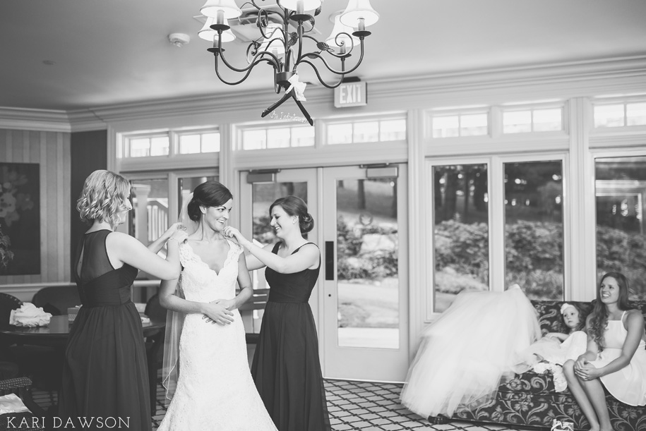 This lovely bride is getting ready for her rustic elegant black tie country club wedding