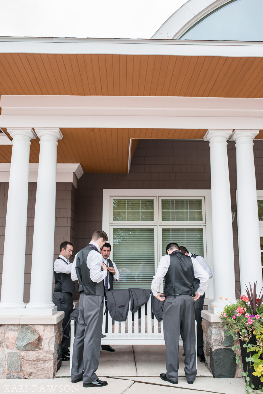 Groomsman getting ready for this black tie country club wedding