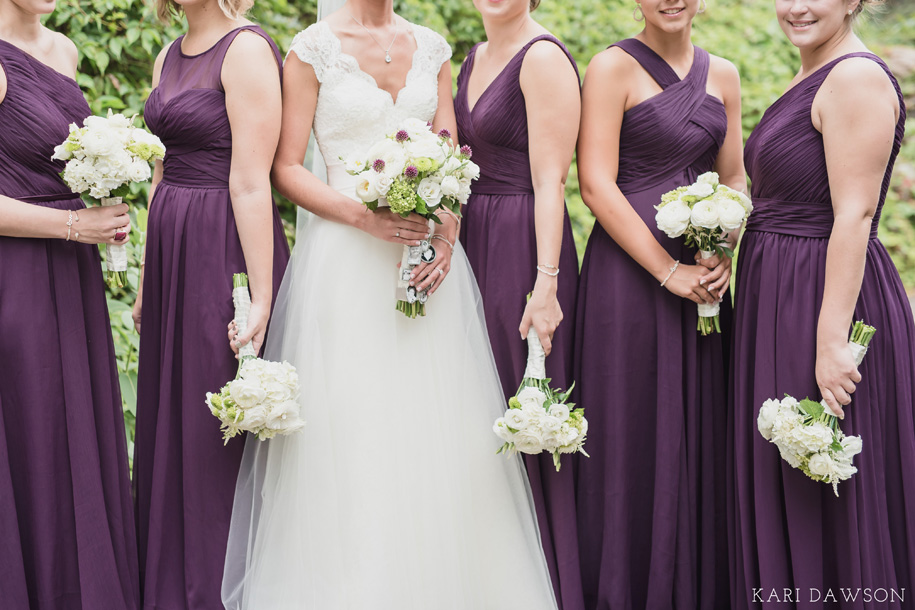 Rustic elegant country club wedding with purple bridesmaid dresses and Bouquets of creams, greens and purple