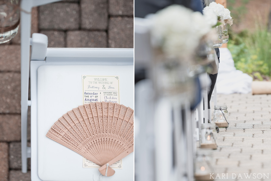 Programs and fans to keep guests cool and candles in mason jars complete the decor for this rustic elegant outdoor wedding ceremony in the woods.