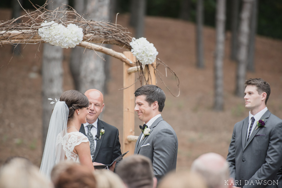 Rustic twig and branch arbor for a rustic elegant outdoor ceremony in the woods l Lace wedding dress and tulle skirt l Tuxedo l Bow tie