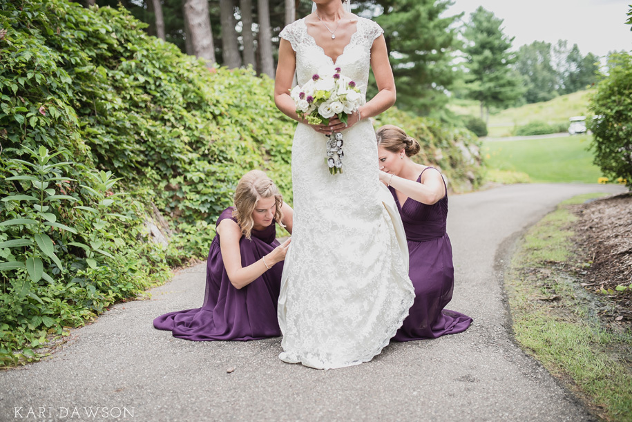 Bustling this brides dress after her rustic outdoor ceremony in the woods before the black tie country club reception l Lace wedding dress l Purple bridesmaid dress l Rustic bouquet