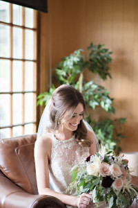 Gorgeous bridal portrait at Waldenwoods Ann Arbor, Michigan with a lace halter wedding dress and rustic bouquet.