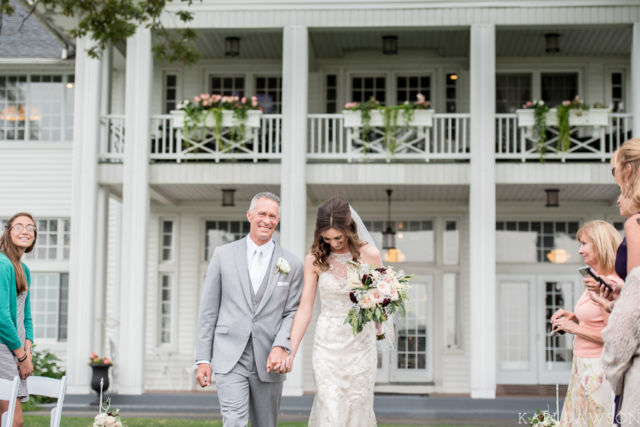 What a great moment between the bride and her father before the rustic outdoor wedding ceremony at waldenwoods