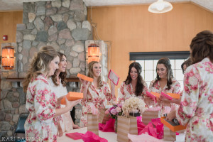 Shabby chic pink floral bridesmaids robes to get ready in and Kate Spade Clutch both make beautiful gifts!