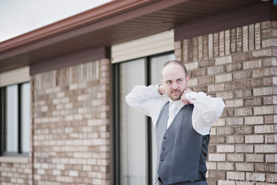 Groom getting ready for the big day l Romantic and Rustic Outdoor Inner Circle Estate Wedding by Kari Dawson