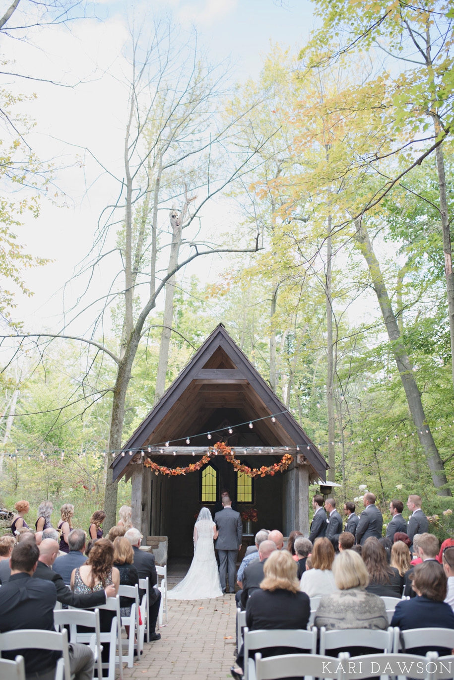 String Lights and Leaf Garland for an Outdoor Ceremony l Rustic and Romantic Outdoor Inner Circle Estate Wedding in the woods by Kari Dawson