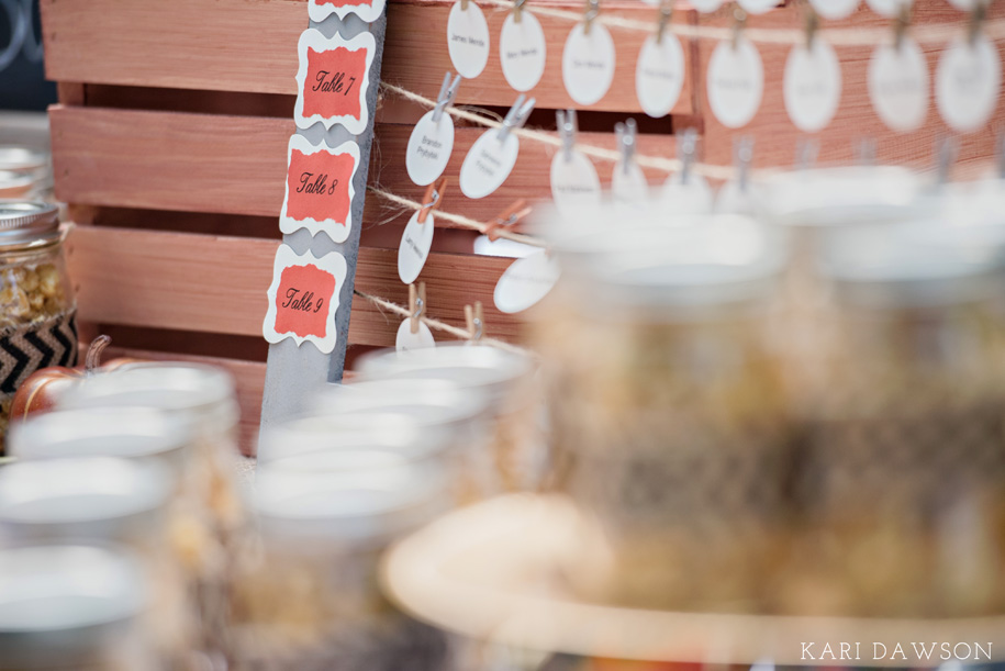 Use a frame without the glass to string your place cards l name cards l escort cards l Rustic and Romantic Outdoor Inner Circle Estate Wedding in the woods by Kari Dawson