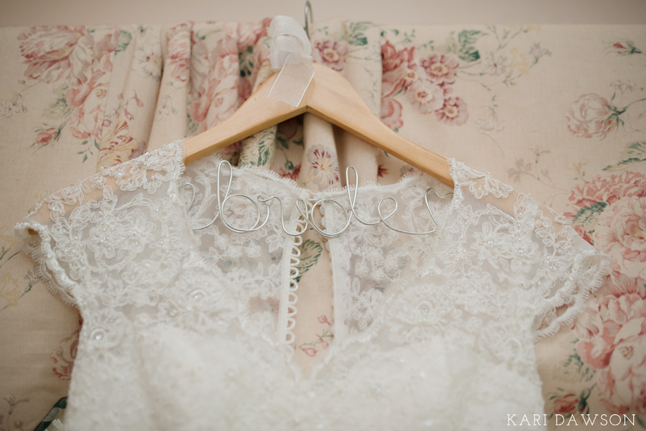 Bride wedding dress hanger for your wedding day l Outdoor Inner Circle Estate Wedding by Kari Dawson