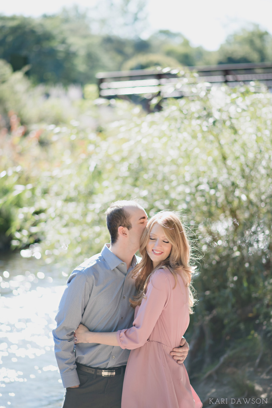 Romantic engagement session pose and great pink outfit inspiration. Rustic outdoor engagement photographer, Kari Dawson in Rochester, Michigan