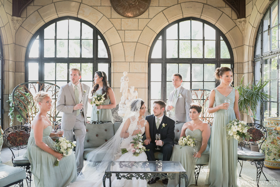 I love this wedding party photo! Looks like it belongs in a magazine . Bridesmaids in mint green . Groomsman in grey suits . Meadowbrook Hall Wedding by Kari Dawson