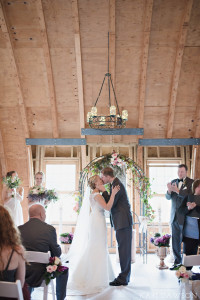 First kiss . Rustic and romantic barn wedding ceremony at On Eagles Wings in Midland Michigan by Kari Dawson Photography