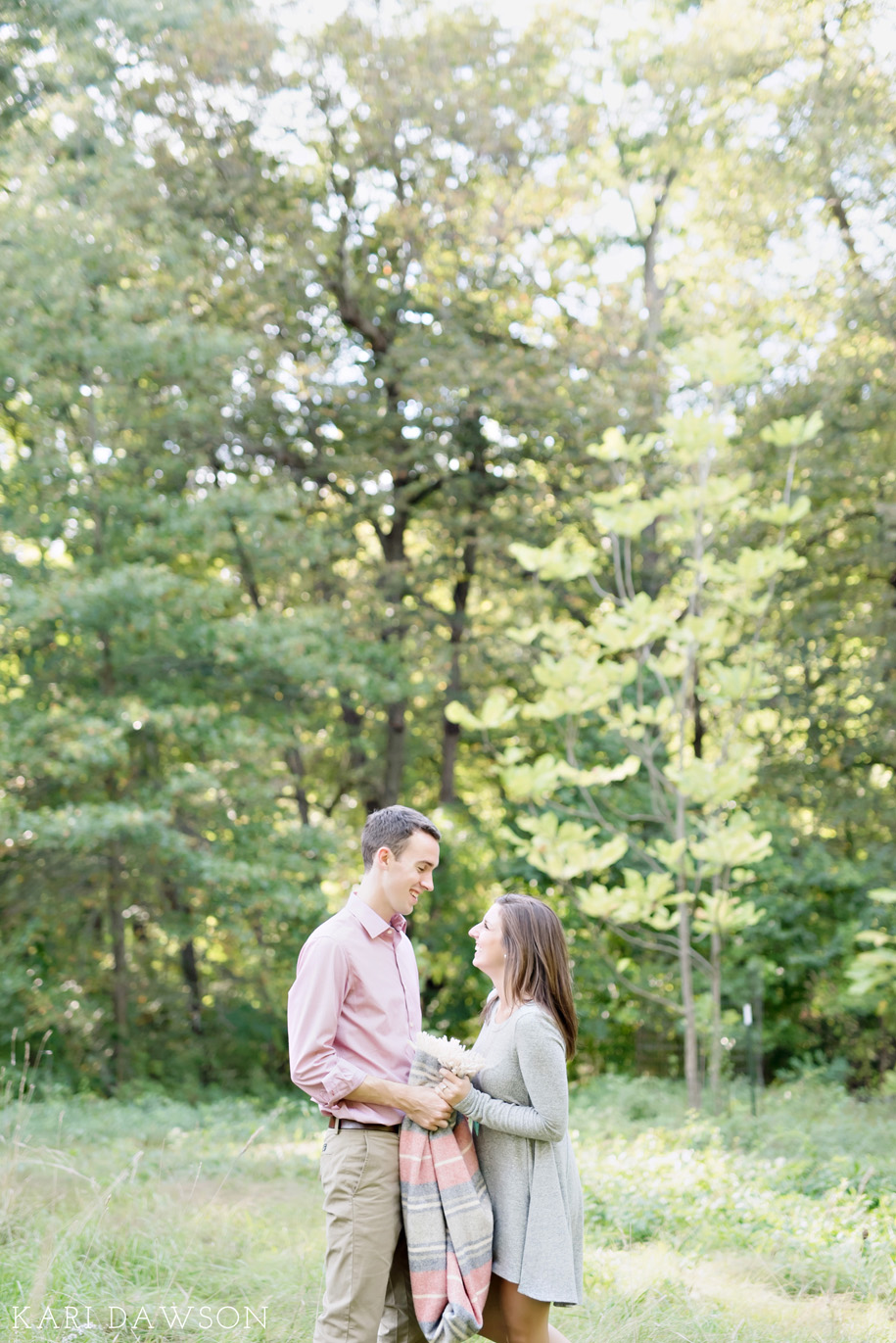 A fall Arboretum engagement in the woods just off of the University of Michigan campus by Kari Dawson Photography