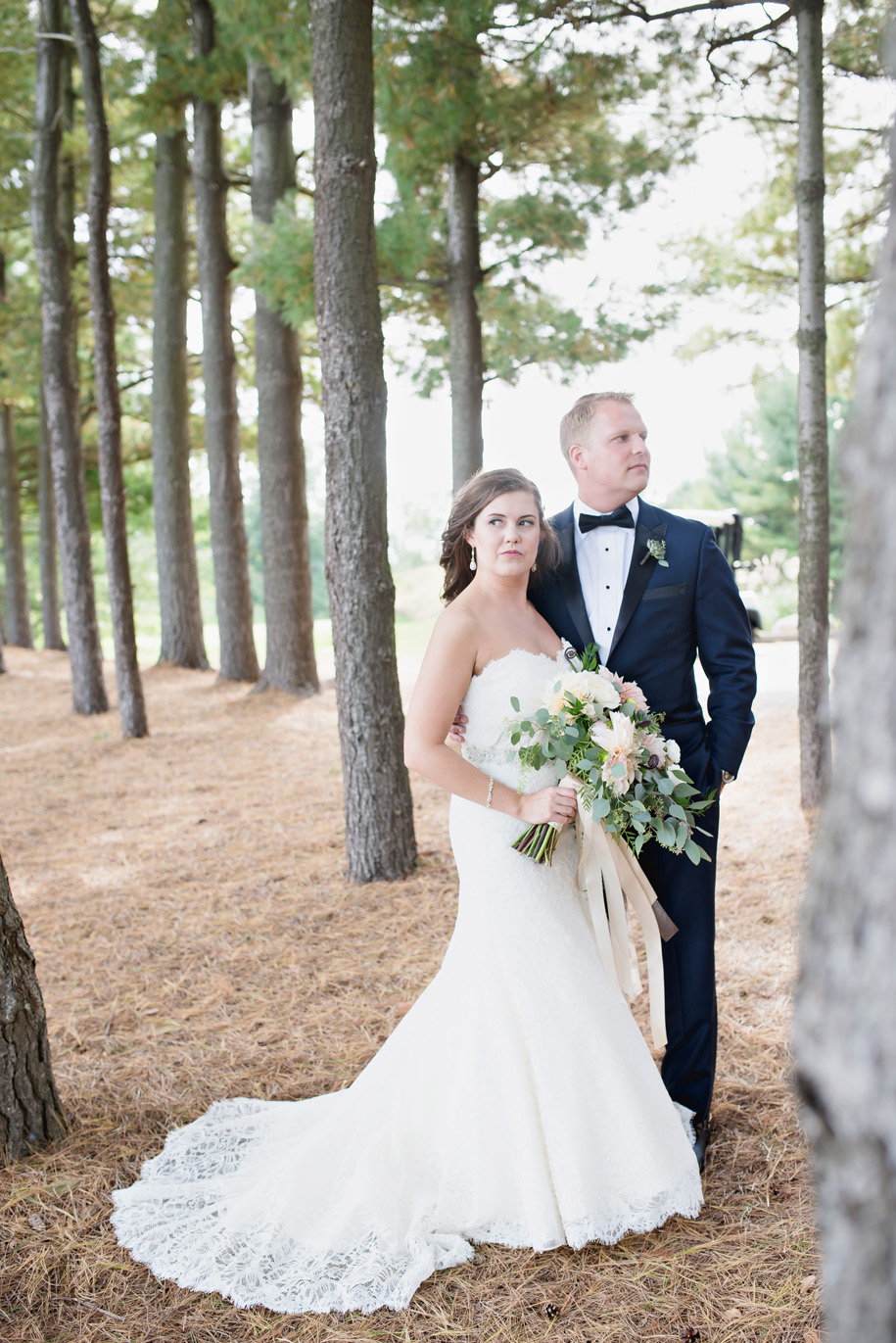 Oakhurst Country Club Wedding. Dramatic, modern, editorial and romantic bride and groom portraits in dreamy light of the pine trees . Black Tie Country Club Wedding . Kari Dawson Photography