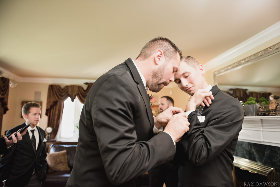 Final preparations before the ceremony before this fall wedding in Michigan by Kari Dawson