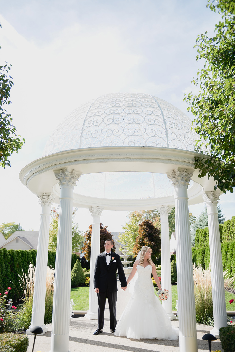 Bride and groom portraits at a fall wedding in Michigan by Kari Dawson