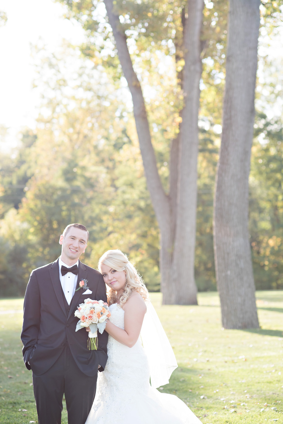 George George Park Bride and groom portraits at a fall wedding in Michigan by Kari Dawson