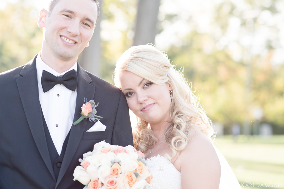 George George Park Bride and groom portraits at a fall wedding in Michigan by Kari Dawson