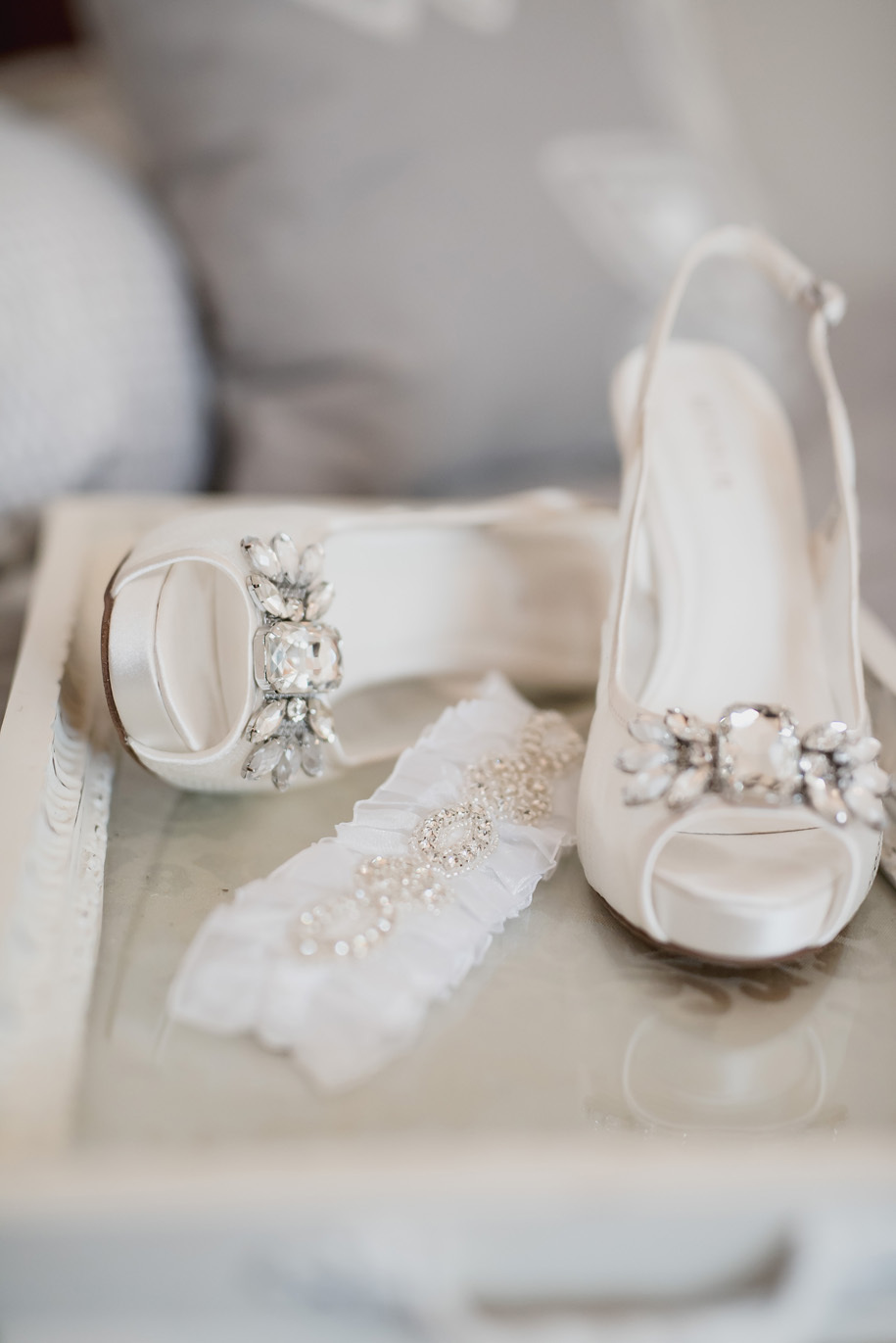 This bride's wedding day shoes are to die for! Cream satin sling back with crystal and gem accents. Love for a fall wedding in Michigan by Kari Dawson