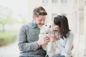 Cute Pom-Chi giving kissing during this fun engagement session in Detroit, MI by Kari Dawson Photography