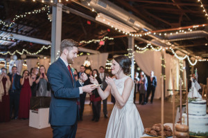 Maroon and navy Royal Oak Farmer's Market wedding in Royal Oak, Michigan by Kari Dawson. Top rated Metro Detroit Documentary wedding photographer.