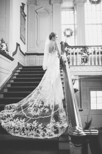 Lovett Hall at Greenfield Village winter wedding by Kari Dawson. Top rated Southeastern Michigan documentary wedding photographer.