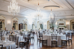 Lovett Hall at Greenfield Village winter wedding by Kari Dawson. Top rated Southeastern Michigan documentary wedding photographer.