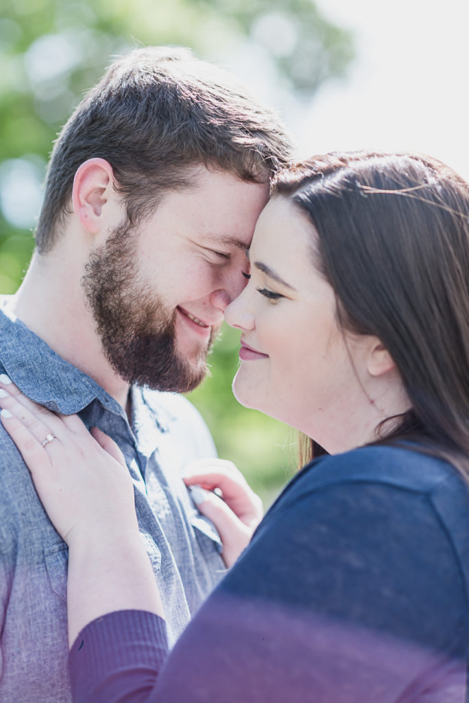 Fenton Michigan engagement session in the park provided by Kari Dawson, top-rated Fenton Engagement and Wedding Photographer and her team.