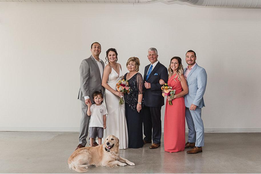 I absolutely love it when couples have their dogs or puppies as part of their wedding day! Coral and Gray College for Creative Studies Summer Wedding in Detroit, Michigan by Kari Dawson Photography.