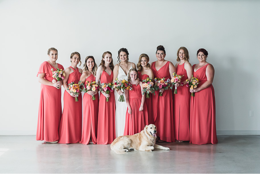 Bride and groom portraits with their dog on their wedding day. I absolutely love it when couples have their dogs or puppies as part of their wedding day! Coral and Gray College for Creative Studies Summer Wedding in Detroit, Michigan by Kari Dawson Photography.
