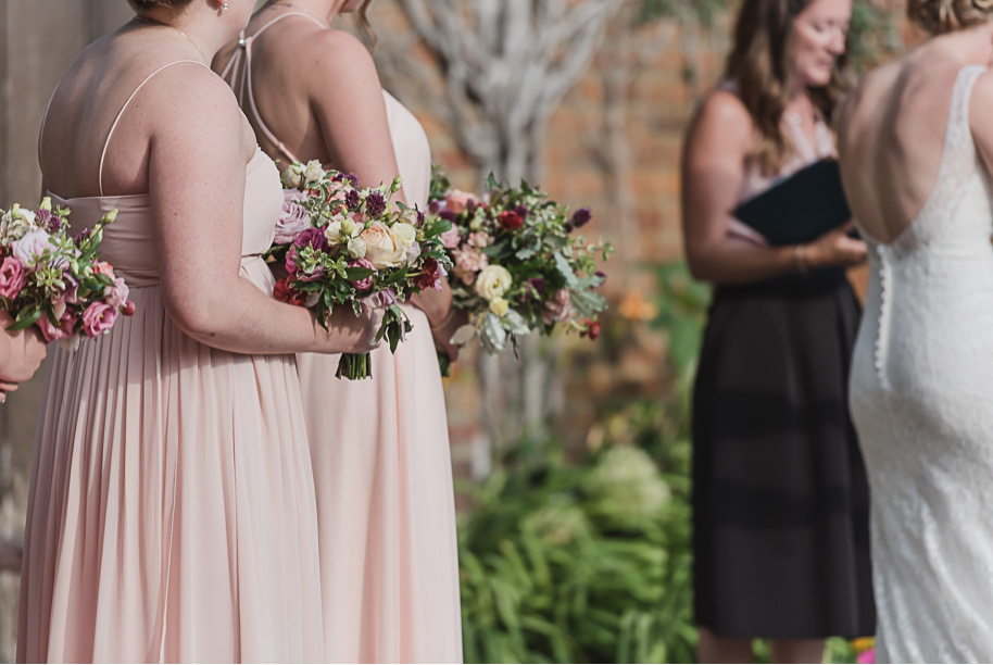 Lovely and colorful unstructured wedding bouquet. Colorful Meadow Brook Mansion wedding in Rochester, Michigan provided by Kari Dawson, top-rated Rochester, Michigan wedding photographer, and her team. 
