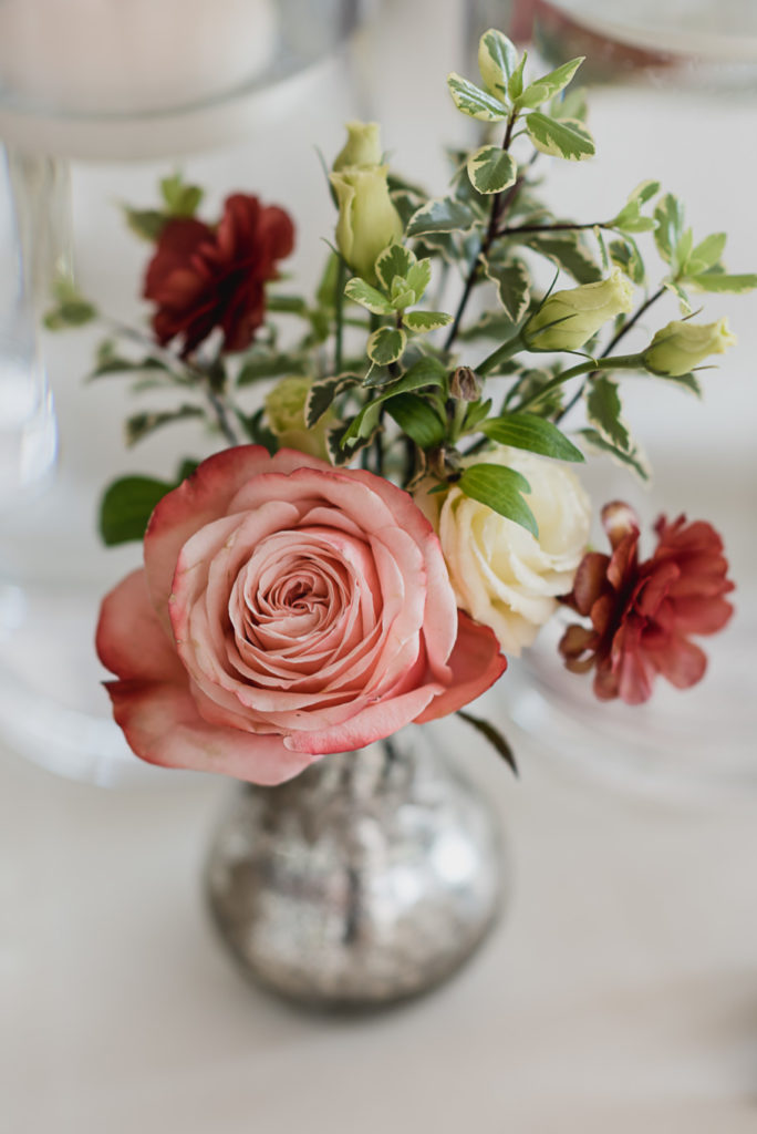This rustic unstructured wedding day centerpiece is so on trend! Colorful Meadow Brook Mansion wedding in Rochester, Michigan provided by Kari Dawson, top-rated Rochester, Michigan wedding photographer, and her team. 