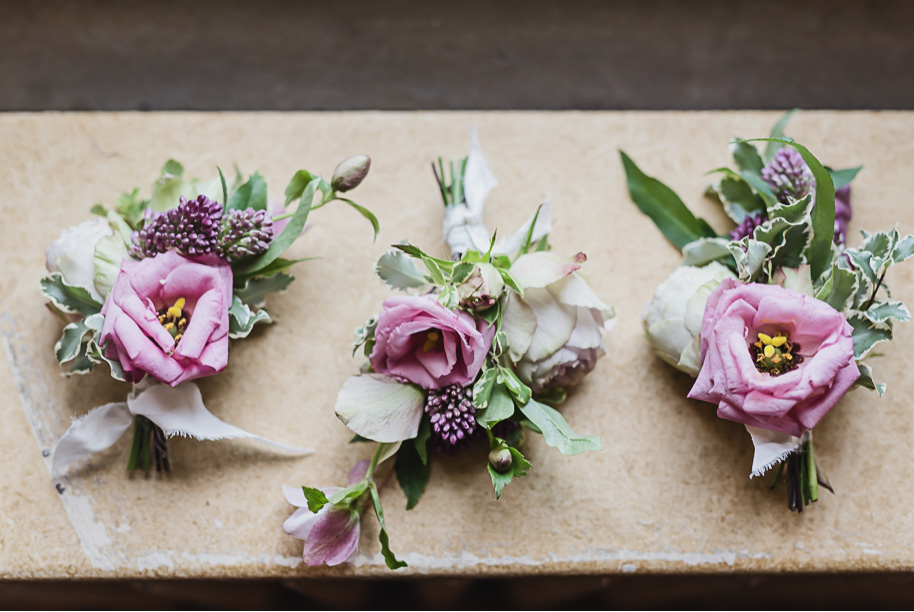 These unstructured lapel corsages are so special and so beautifully made. Colorful Meadow Brook Mansion wedding in Rochester, Michigan provided by Kari Dawson, top-rated Rochester, Michigan wedding photographer, and her team. 