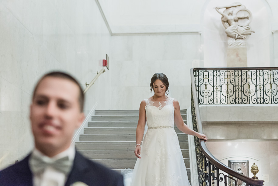 Those final moments before your first look. Sage and navy summer wedding at the Detroit Athletic Club in Detroit, Michigan provided by Kari Dawson, top-rated Detroit wedding photographer, and her team.