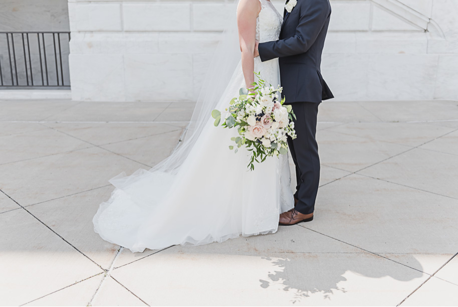 For the love of a perfect unstructured wedding bouquet! Sage and navy summer wedding at the Detroit Athletic Club in Detroit, Michigan provided by Kari Dawson, top-rated Detroit wedding photographer, and her team.
