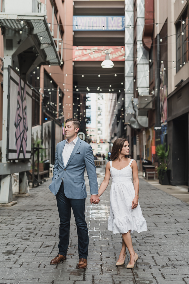Sarah and Patrick's Downtown Detroit engagement photos, by Kari Dawson, were captured at the Belt near the Z Lot parking garage in Detroit, Michigan during a perfect summer sunset.