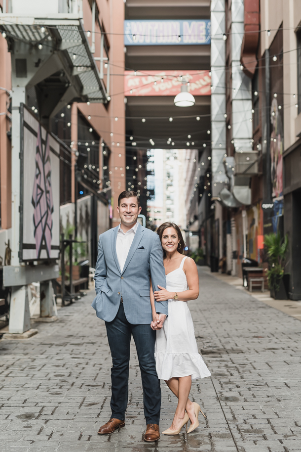 Sarah and Patrick's Downtown Detroit engagement photos, by Kari Dawson, were captured at the Belt near the Z Lot parking garage in Detroit, Michigan during a perfect summer sunset.