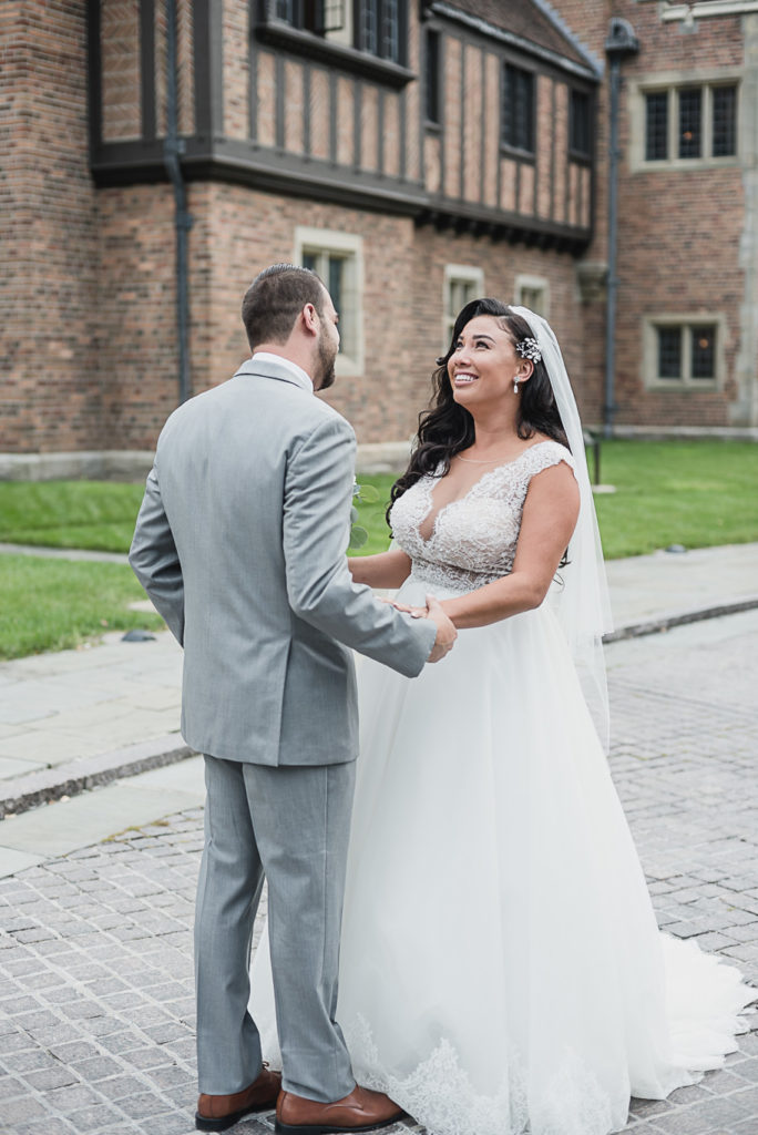 This gray and navy Meadow Brook wedding in Rochester, Michigan is a stunning outdoor garden wedding ceremony with a luxurious tented reception provided by Kari Dawson, top-rated Rochester wedding photographer, and her team. 