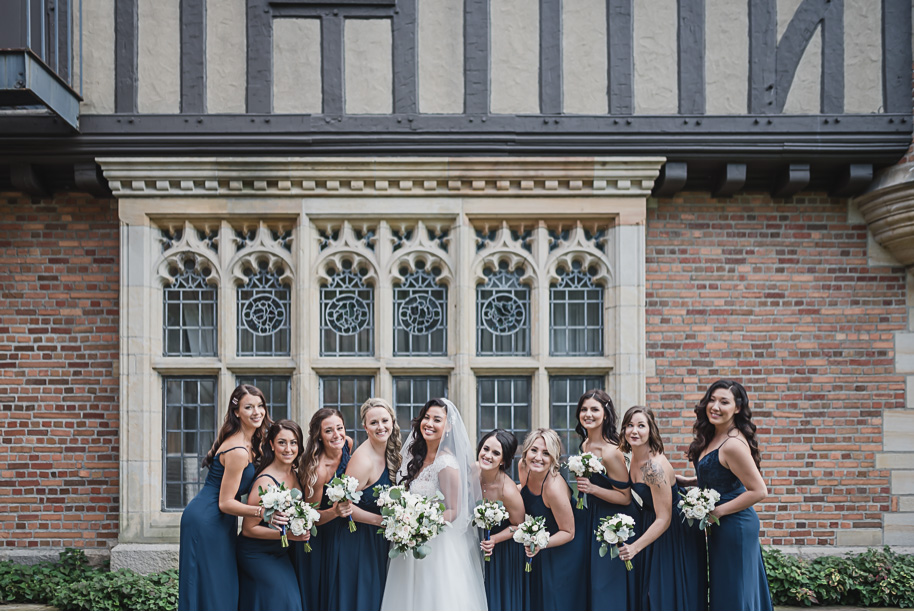 This gray and navy Meadow Brook wedding in Rochester, Michigan is a stunning outdoor garden wedding ceremony with a luxurious tented reception provided by Kari Dawson, top-rated Rochester wedding photographer, and her team. 