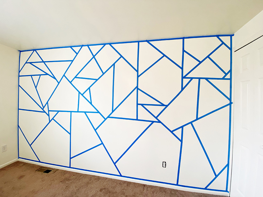Step by step DIY project featuring instructions for creating your stunning geometric feature wall (with photos).