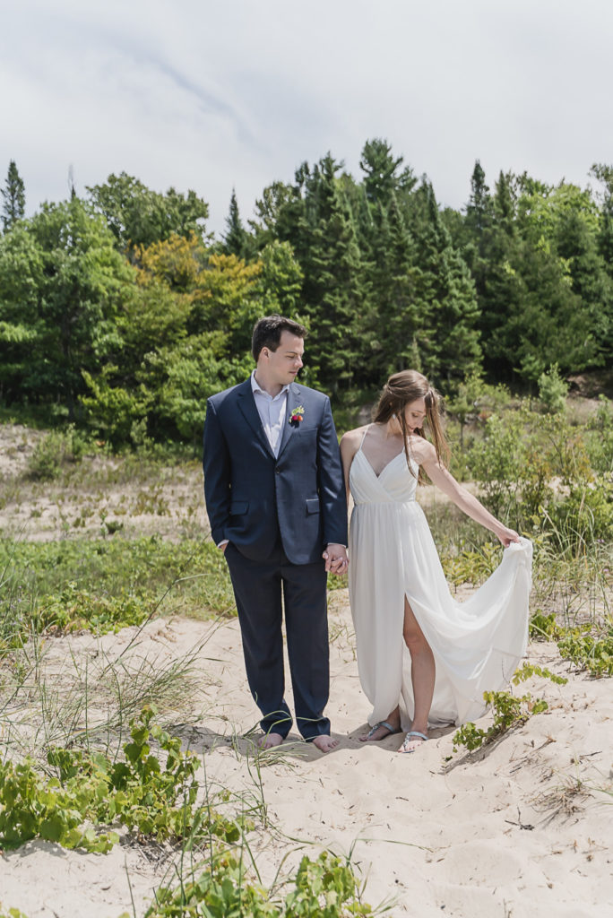 Traverse City Wedding at Esch Road Beach near the Sleeping Bear Sand Dunes in Northern Michigan Provided by Kari Dawson, top-rated Northern Michigan Wedding Photographer, and her team. 