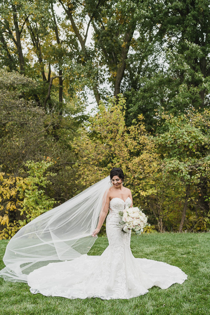 An intimate black tie backyard wedding in Armada Michigan provided by Kari Dawson top rated Southeastern Michigan wedding photographer and her team.