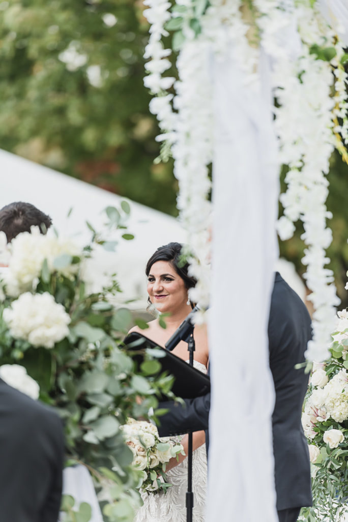 An intimate black tie backyard wedding in Armada Michigan provided by Kari Dawson top rated Southeastern Michigan wedding photographer and her team.
