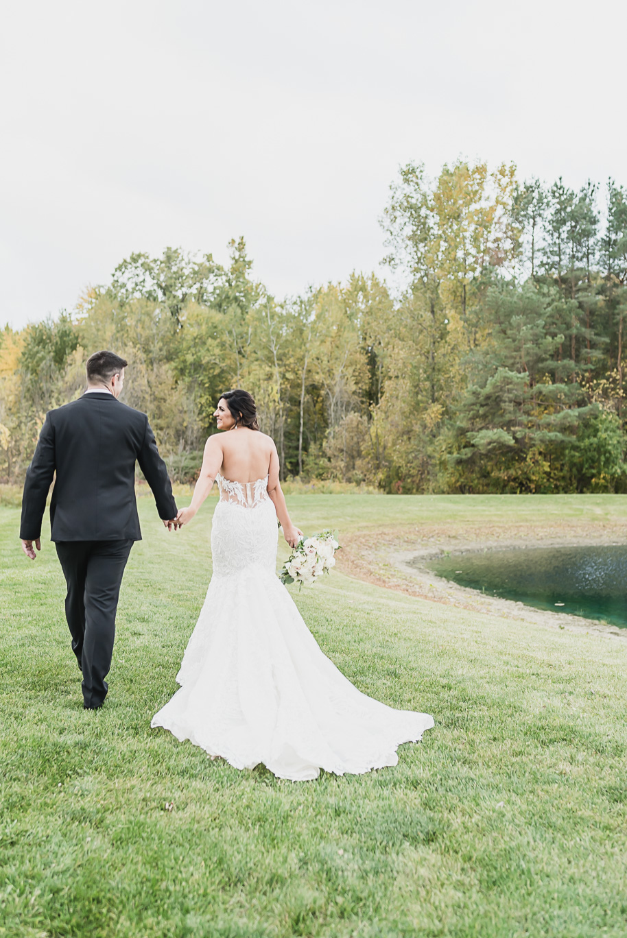 An intimate black tie backyard wedding in Armada Michigan provided by Kari Dawson top rated Southeastern Michigan wedding photographer and her team.
