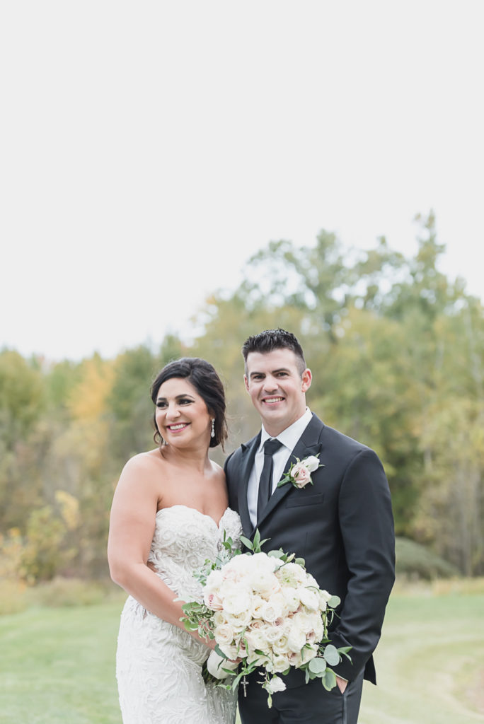 An intimate black tie backyard wedding in Armada Michigan provided by Kari Dawson top rated Southeastern Michigan wedding photographer and her team.