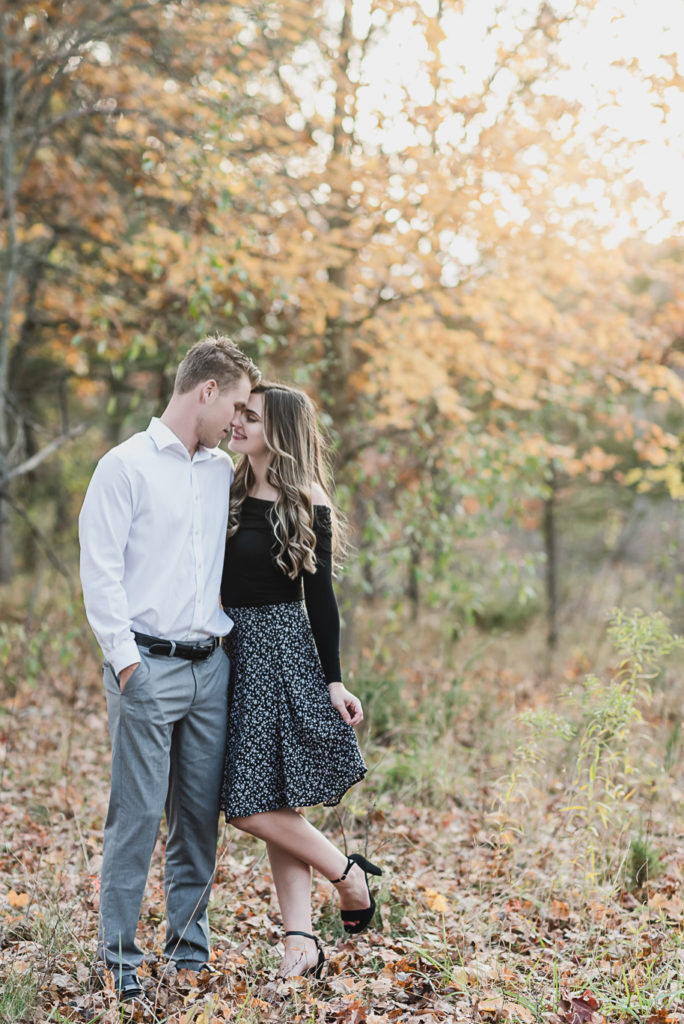 Fall sunset Independence Oaks engagement photos in Clarkston, Michigan provided by Kari Dawson, top-rated Metro Detroit wedding photographer.