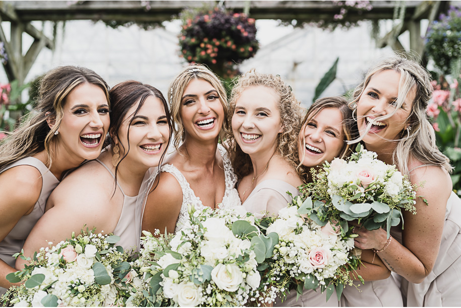 Elegant blush and black backyard wedding in Monroe, Michigan provided by Kari Dawson, top-rated Michigan wedding photographer, and her team.
