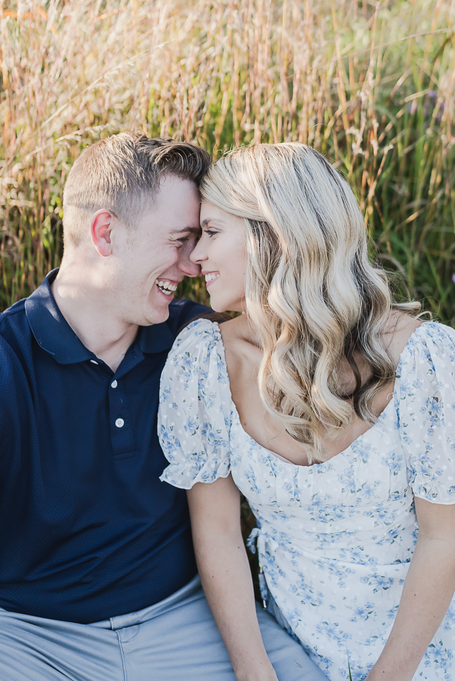 Fall romantic sunset engagement pictures at Stony Creek Metro Park in Washington, Michigan provided by Kari Dawson, top-rated Metro Detroit wedding photographer, and her team.